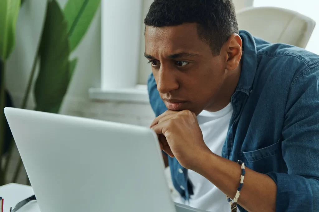 A person comparing different truck parts brands on a computer screen.